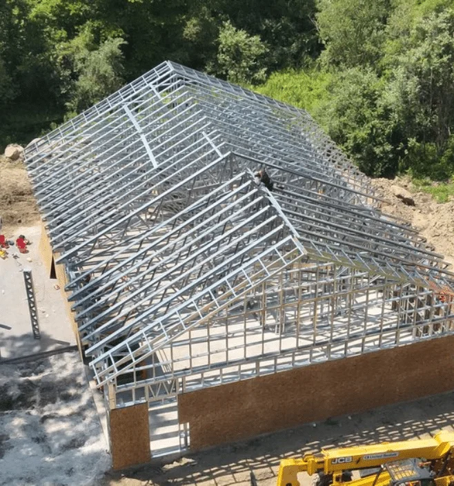 Aerial view of steel frame barndominium construction in North Carolina