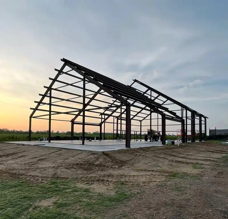 Barndominium frame at sunset in North Carolina